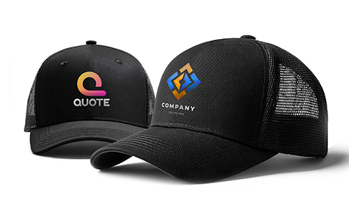 Two caps, one with QUOTE and gradient Q logo, one with COMPANY and geometric emblem, ribbon nearby