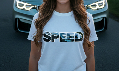 Person in white SPEED t-shirt standing before car with headlights on, bold reflective letters across chest