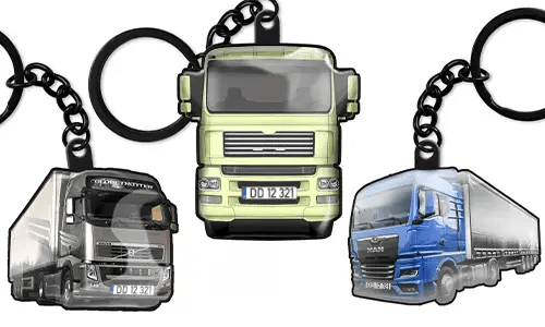 Truck-shaped keychains featuring three different lorry designs displayed as customizable vehicle accessories