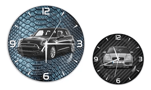 Two wall clocks with car illustrations: left with black car on blue reptile texture, right with blue car on carbon background