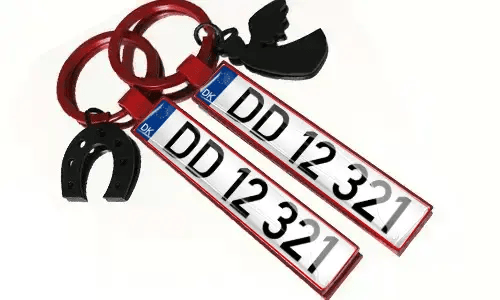 Metal keychains with license plate numbers and accessories