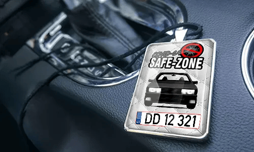 Auto-Safezone-Anhänger mit Weiß Leder Hintergrund im Wagen Auto-Safezone-Anhänger