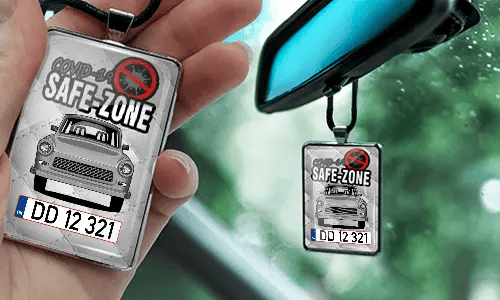 Auto-Safezone-Anhänger mit Weiß Leder Hintergrund nd Lederkette im Wagen Safezone-Anhänger