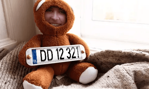 Cuddly toy with photo in the house