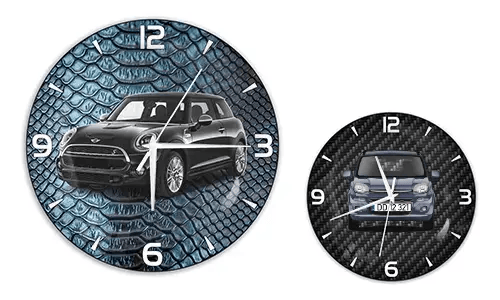 Two wall clocks with car illustrations: left with black car on blue reptile texture, right with blue car on carbon background